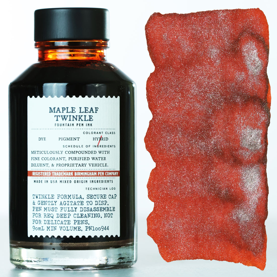 Bottle of Maple Leaf Twinkle fountain pen ink with a sample swatch on a white background